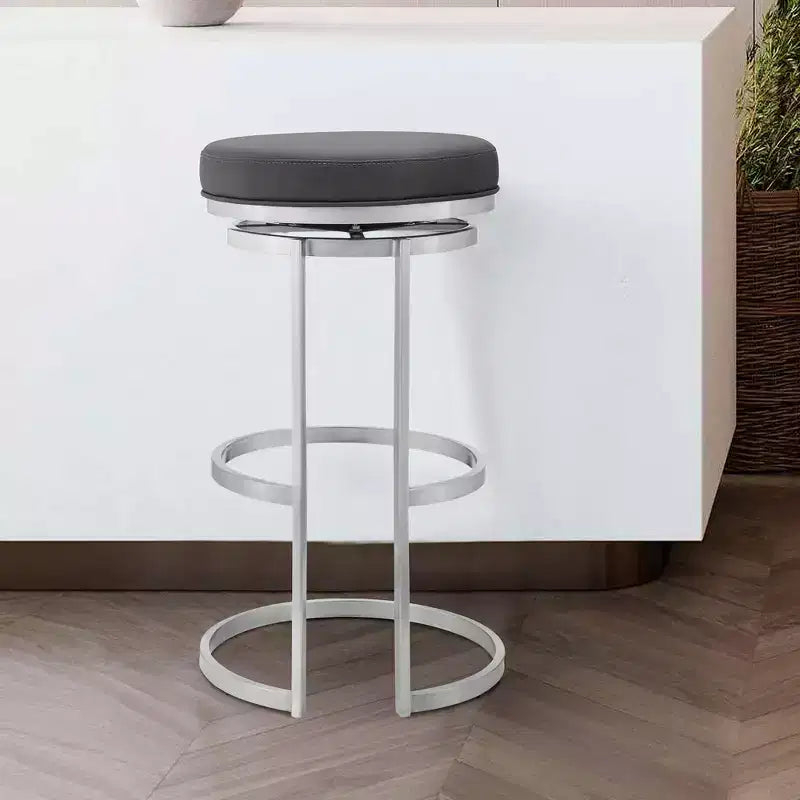 Taburete de bar a la altura de la encimera con cuero sintético gris y acero inoxidable cepillado